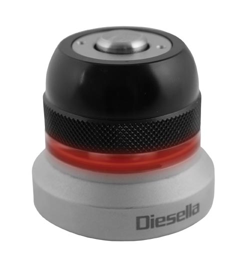 Fjeder til optisk toolsetter med magnet